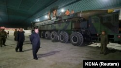 North Korean leader Kim Jong Un inspects a Hwasong-14 missile, which the United States confirmed was an intercontinental ballistic missile, in this undated photo released by North Korea's Korean Central News Agency (KCNA) in Pyongyang on July 5.