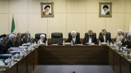 Iran's Expediency Discernment Council meets in Tehran on February 16. At center is Ayatollah Larijani, head of Iran's conservative Judiciary. The empty seat next to him is probably reserved for President Hassan Rouhani, who has not been attending council meetings.