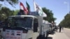 Iraqi Shiite militia arriving vehicles in Iran's Khuzestan province "to help in flood relief". April 11, 2019