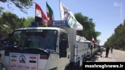 Iran - Iraqi Shiite militia arriving vehicles in Iran's Khuzestan province "to help in flood relief". April 11, 2019