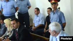 Armenia - Two of the men charged with beating to death military doctor Vahen Avetian at the start of their trial in Yerevan, 13Sept2012.