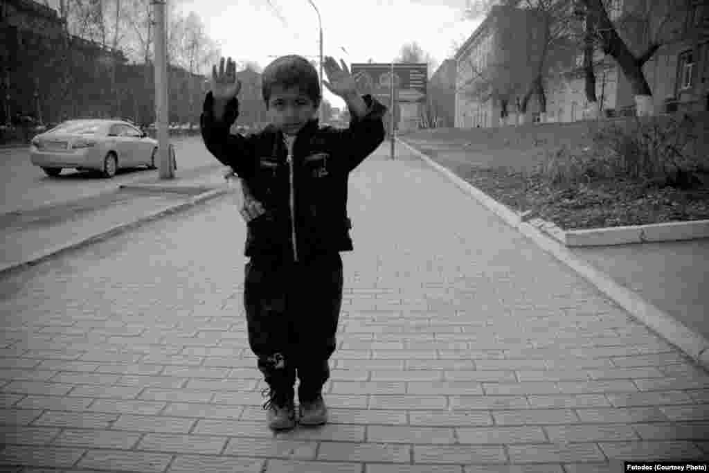 Kurdish boy from Uzbekistan in Novosibirsk. From the series, "Not Children's Fears, 2007." Photo by Aleksander Bendyukov.