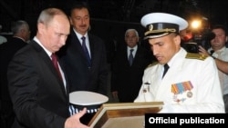 Azerbaijan -- Putin, Aliyev go to Russia’s Dagestan rocket ship, walk in old town of Baku - 13Aug2013