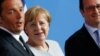 Italian Prime Minister Matteo Renzi with German Chancellor Angela Merkel (center), and French President Francois Hollande (right) in Berlin in June