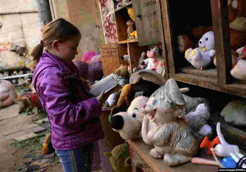 When RFE/RL visited, this girl spent several minutes browsing through the courtyard...