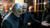 IRGC Qods force commander Qassem Soleimani attending funeral of Zarif's mother in 2013. File photo