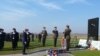 Serbian President Boris Tadic pays his respects to the more than 200 victims killed by Belgrade-led troops in 1991 near Vukovar, Croatia.