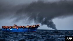 Migrantët duke arritur në një port në Itali gjatë vitit të kaluar