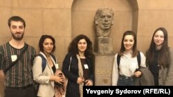 (l-r) Havel Fellows Tornike Mandaria, Gulnar Salimova, Hermine Virabyan, Victoria Colesnic, and Karina Merkuryeva, with the bust of Czech President Vaclav Havel at the U.S. Capitol in Washington.