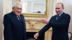 Генри Киссинджер и Владимир Путин в Москве. 20 января 2012 года