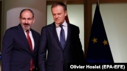 BELGIUM -- Armenian Prime Minister Nikol Pashinian (L) and the President of the European Council Donald Tusk arrive for a joint statement to the media following their meeting in Brussels, March 5, 2019