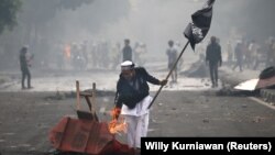 Pamje nga protestat në Indonezi.
