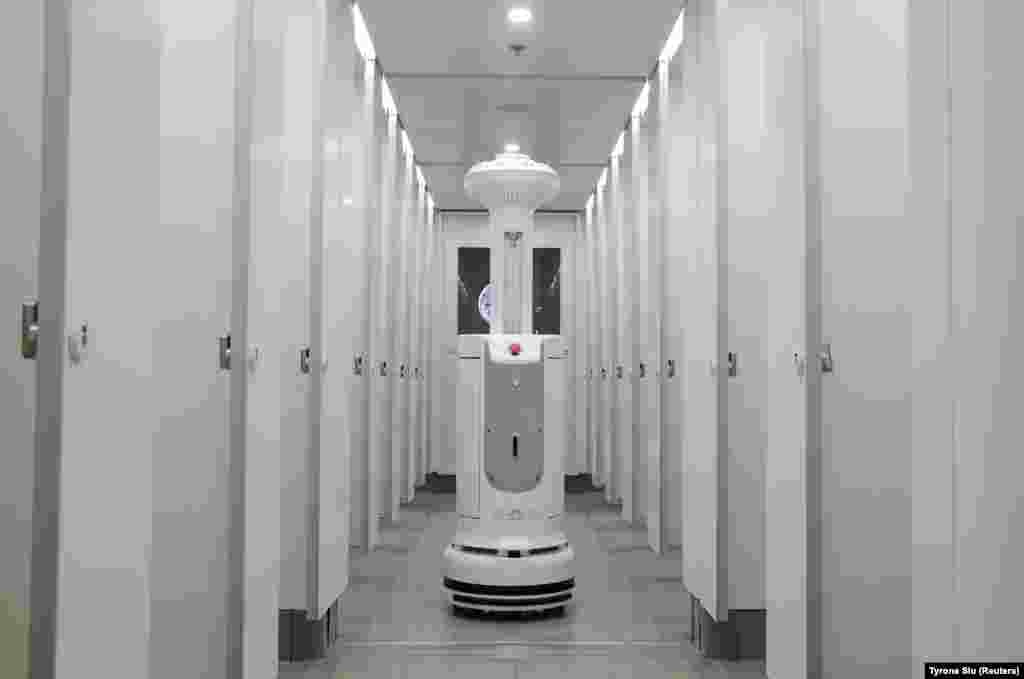 An Intelligent Sterilization Robot (ISR), produced by TMiRob of China, uses UV light to sanitize, at a toilet, following the coronavirus disease (COVID-19) outbreak, at the Hong Kong International Airport, in Hong Kong, China, May 7, 2020.