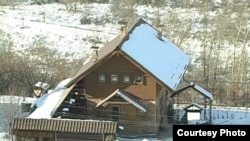 This holiday house was demolished in what Kozlov believes was a politically motivated act. 