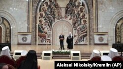 Владимир Путин и патриарх Кирилл на Архиерейском соборе РПЦ 