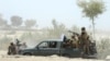 Pakistan -- Soldiers patrol at Labach area, in the earthquake-devastated district of Awaran, Balochistan province, September 26, 2013