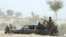 Pakistan -- Soldiers patrol at Labach area, in the earthquake-devastated district of Awaran, Balochistan province, September 26, 2013