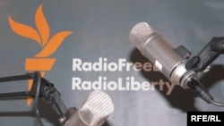 Microphones and RFERL logo on background