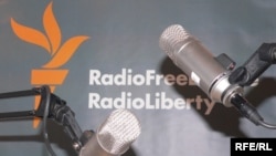 Microphones and RFERL logo on background