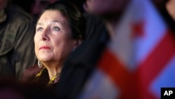 Georgian President Salome Zurabishvili attends an opposition rally in Tbilisi on October 20. She has called for street protests after a parliamentary vote that she claims was marred by a "Russian special operation."