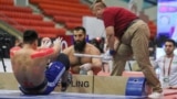 Athletes at the 2024 World Nomad Games compete in mas wrestling, a one-on-one stick-pulling game attributed to the Yakut people of Siberia.