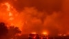 Focul se deplasează către autostrada 36, ​​în timp ce incendiul din Park continuă să ardă lângă Paynes Creek, în Tehama County, California - 26 iulie 2024.