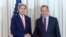 U.S. Secretary of State John Kerry (left) shakes hands with Russian Foreign Minister Sergei Lavrov on August 26 in Geneva.