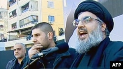 A TV grab shows Hizballah leader Sheikh Hassan Nasrallah delivering a speech in southern Beirut on December 6.