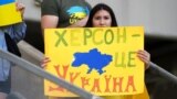 POLAND – Ukrainian fan with a poster "Kherson is Ukraine" before the UEFA League of Nations match between Ukraine and Armenia. Lodz, Poland, June 11, 2022