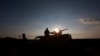 A Popular Mobilisation Forces (PMF) fighter rides in a military vehicle at the Iraqi-Syrian border near al-Qaim, Iraq, November 26, 2018. Picture taken November 26, 2018. REUTERS/Alaa al-Marjani