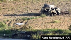 The wreckage of investigative journalist Daphne Caruana Galizia's car is seen after a car bomb killed her in Malta, October 16, 2017