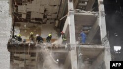 საილუსტრაციო ფოტო. უკრაინის ქალაქ პოლტავაზე რუსეთის სარაკეტო დარტყმის შედეგად დანგრეული სამხედრო სასწავლებლის შენობა