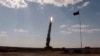 Россия проводит пуск новой ракеты на полигоне Сары-Шаган. Снимок с видео (пресс-служба Минобороны РФ, ТАСС).
