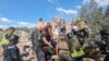 Rescuers work at a site of a deadly Russian missile strike in Kryviy Rih on June 12.