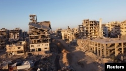 Një pamje nga droni tregon shkatërrimin në një lagje banimi, pas tërheqjes së forcave izraelite nga zona, në Qytetin e Gazës, më 25 tetor 2025.