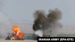 IRAN - A handout photo shows an explosion during a military exercise by the Iranian Army in the northwest of Iran, close to the border with Azerbaijan, October 1, 2021.