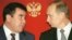 Turkmenistan's Niyzov (left) has tried to break free of Putin's Russia