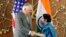 Indian Foreign Minister Sushma Swaraj (right) greets U.S. Secretary of State Rex Tillerson in New Delhi on October 25. 