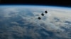 Hundreds of commercial and military satellites fly in "low earth orbit," a crowded section of Earth's outer atmosphere.   