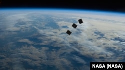 Hundreds of commercial and military satellites fly in "low earth orbit," a crowded section of Earth's outer atmosphere.   