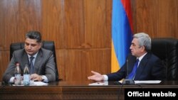 Armenia -- President Serzh Sarkisian (R) addresses Prime MInister Tigran Sarkisian during a government meeting in Yerevan, 15Sep2012.