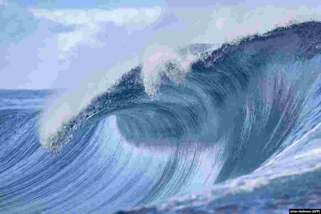 A wave crashes off Teahupoo, Tahiti. (AFP/Brian Bielmann)