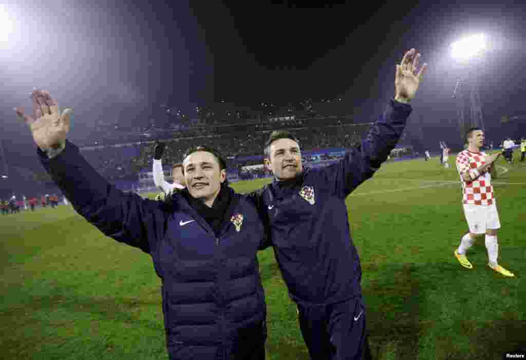 Izbornik Niko Kovač i njegov brat Robert slave pobjedu, Zagreb, 19. novembar 2013. 