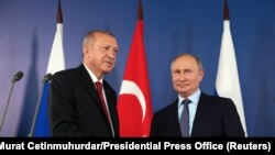 Реджеп Эрдоган (слева) и Владимир Путин (справа).