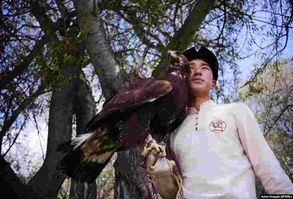 The birds: Eagles were as common as seagulls at this event. We even saw one chilling between the humps of a camel. Despite their merciless appearance, there is a genuine bond between the birds and their handlers. This teenage handler had just walked over to his distressed eagle to put cheek against beak and calm him down. &nbsp;