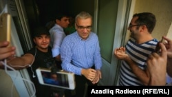 Azerbaijani opposition leader Ilqar Mammadov is greeted by supporters upon his release on August 13.