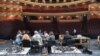 Armenia -- Volunteers work on producing camouflage netting inside the Yerevan Opera Theater