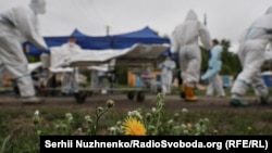 Ukraine -- Repatriation of servicemen of the Ukrainian Armed Forces to Ukraine, morgue, body inspection, 31Jul 2025