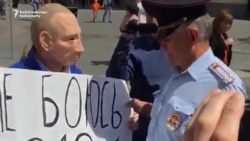 Protester Arrested Again For Wearing Putin Mask