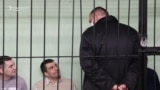  Belarusian blogger Sergei Tikhanovsky (front), husband of former Belarusian presidential candidate Svetlana Tikhanovskaya, attends a sentence hearing at the Gomel Regional Court. Tikhanovsky has been sentenced to 18 years in prison for organizing mass un